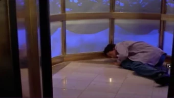 Ross is tossed into the downward elevator