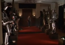 Into a room full of armored statues