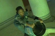 On Dean command she pours Chlorine into the pool