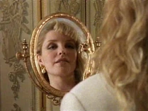 Ms. Valenti admiring herself in the mirror