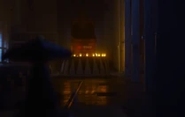 Suddenly a crudely lit circus drum appears