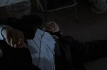 Carl is knocked out cold by it!