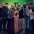 Ariana, Chris, and the crew on the music video set