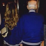 Ari and grandpa in matching blue jackets