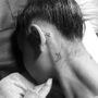 Ariana’s Bee Tattoo.jpeg
