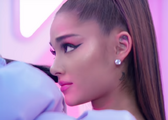 Ariana tattoo in left ear