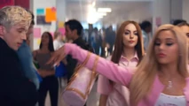 Ariana pushing Troye