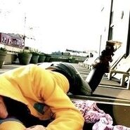 Ariana lying on the ground