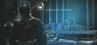 Batman obtaining the Concussion Detonator from his workbench at the Batcave