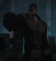 Deadshot aiming one of his twin-mounted wrist guns in Assault on Arkham.