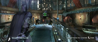 Batman using the Freeze Gun Override at the Iceberg Lounge in Arkham City.