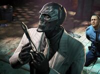 Black Mask preparing to torture a cop in Arkham Origins.