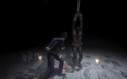 Joker torturing Jason Todd