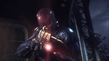 Rechristened as Red Hood, Jason saves Batman