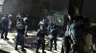 Batman attempting to avoid a mobilized GCPD SWAT Unit in Arkham Origins.