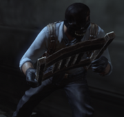 Black Mask attempting to fend off the TYGER Guards with a chair in the Arkham City Processing Center