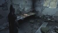 Maxie Zeus' Cell in the Patient Pacification Chamber at the Intensive Treatment Center on Arkham Island