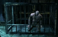 Zsasz imprisoned in his cell at his hideout in Arkham City by Batman