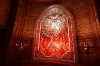 Stained-glass window in Blackgate Chapel in Arkham Shadow.