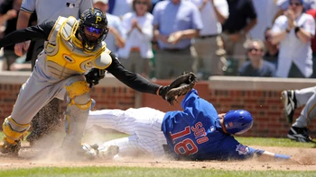 Geovany Soto was tagged out by Ronny Paulino in the third inning.