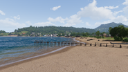View of the town from afar at the coastal village to its east.
