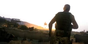 Kerry is assigned one final task before the last of the U.S. troops on Stratis depart.