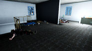 Interior of the clinic's upper rooms. Corpses of the two bandits who attempted to loot the clinic can still be seen.