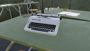 Soviet military Model 3332 coloured in grey with black keys.