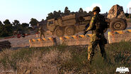 AAF troopers at a checkpoint near Camp Rogain inspect the HEMTT that Cpl. Kerry and SSgt. Adams are riding in.