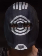 Alpha wearing Pike's "Bullseye" mask.