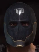 Alpha wearing Rios' "Executive" mask.