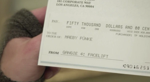 Lindsay finds a check titled Gangee 4: Facelift for ,she later approaches her mother on the prison tennis court to ask her about it ("")