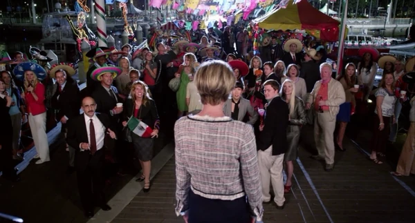 Lindsay and The crowd at Cinco de Cuatro chant the words "put up this wall, put up this wall" ("")