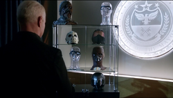 Damien Darhk with his trophies.png