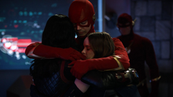 Team Flash group hug before the Flash (Earth-90) in Crisis