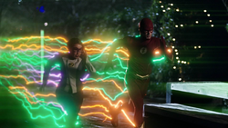 The Flash and XS emitting green lightning