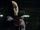 Slade in his old mask pointing a gun.png