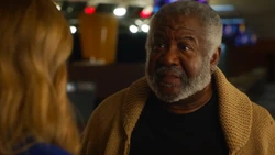 Buddy explains the situation to Sara