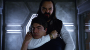 Vandal Savage smothering Ray Palmer