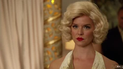 Charlie impersonating Marilyn Monroe.