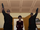 Kuasa and two men approach Mari McCabe.png