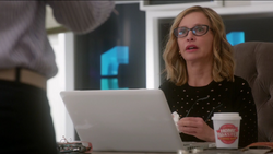 Cat Grant drinking Home Roasted coffee