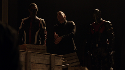 Mr. Terrific and Wild Dog brought Diaz to James