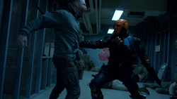 Deathstroke fights Jackal mercenaries