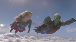 Supergirl and J'onn fly together