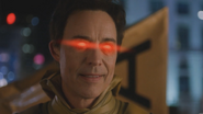 Eobard Thawne's glowing red eyes while disguised as Harrison Wells.