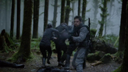 Slade, Oliver, Shado and Yao escape from Fyers