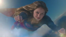 Supergirl pushing her endurace