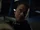 Diaz holds a guard hostage.png