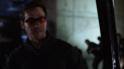 Mon-El as vigilante with sunglasses